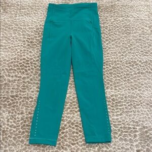 Lululemon Teal High-Waisted crop Leggings with pockets in size 0